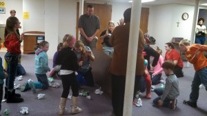 Pastor Jason leads fun with Kids' Club Participants